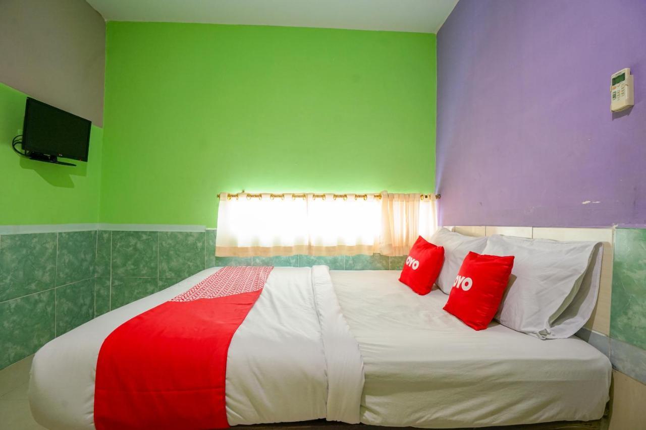 Oyo 1495 Hotel Lendosis Palembang Bagian luar foto